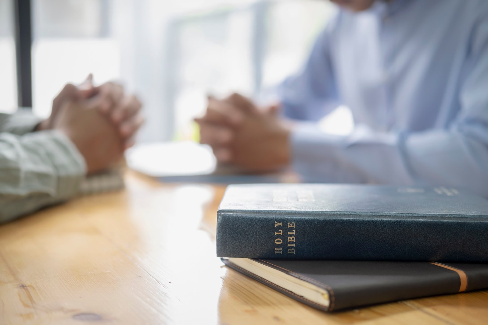 Covenant University Online Two Men Praying for Each Other